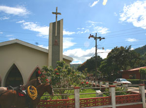 Two horses wait for their riders near the Libano church.